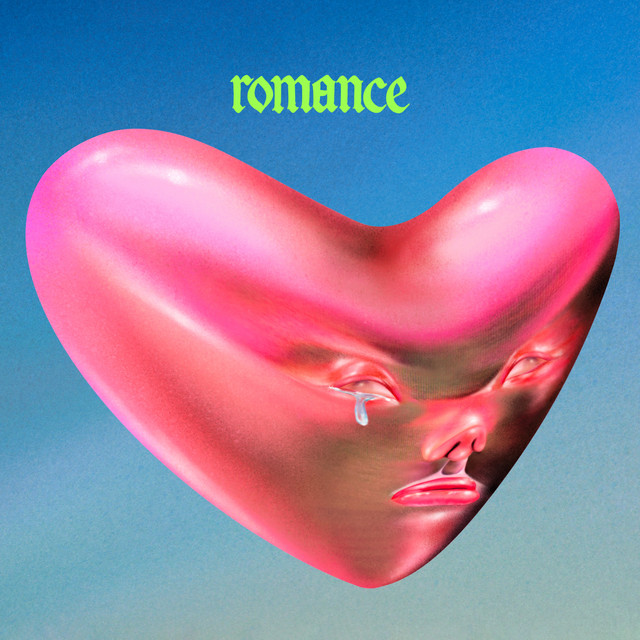 Romance by Fontaines DC album cover featuring a pink metallic love heart with a human-like face which is shedding tears in front of a blue backdrop.