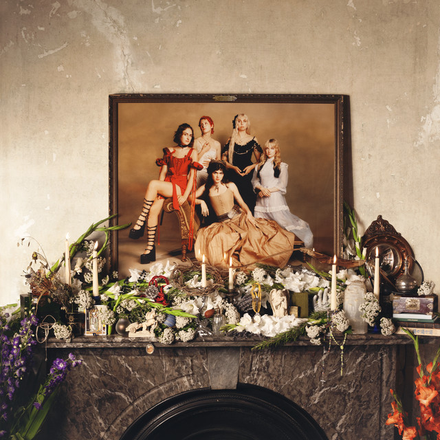 Prelude to Ecstasy by The Last Dinner Party album cover which shows a painted picture of the five band members displayed above a mantlepiece. 