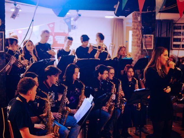 A photograph of The Manglers in performance at the March 2024 charity gig in aid of The Brain Tumour Charity.