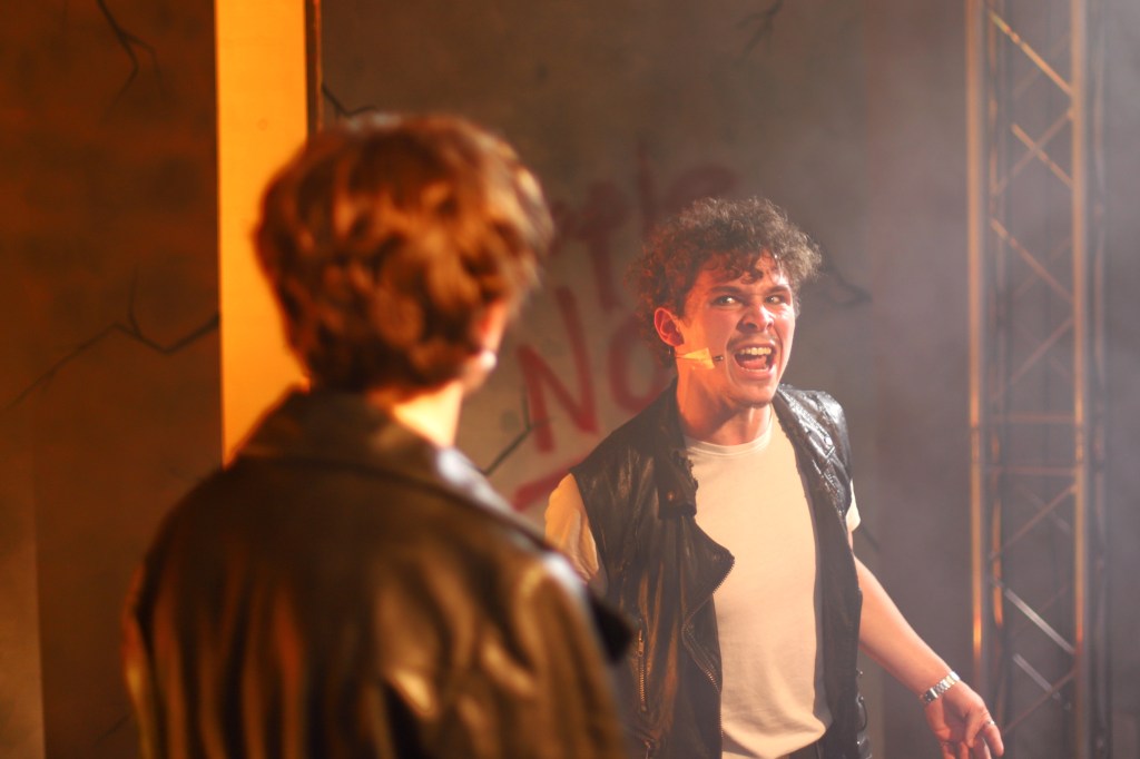 Seb Powell as Judas shouting at Harry Threapleton as Jesus.