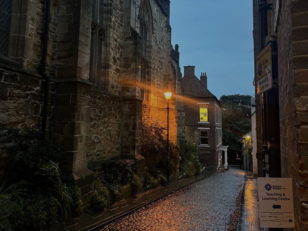 North Bailey in the evening, lit by a single lamppost.