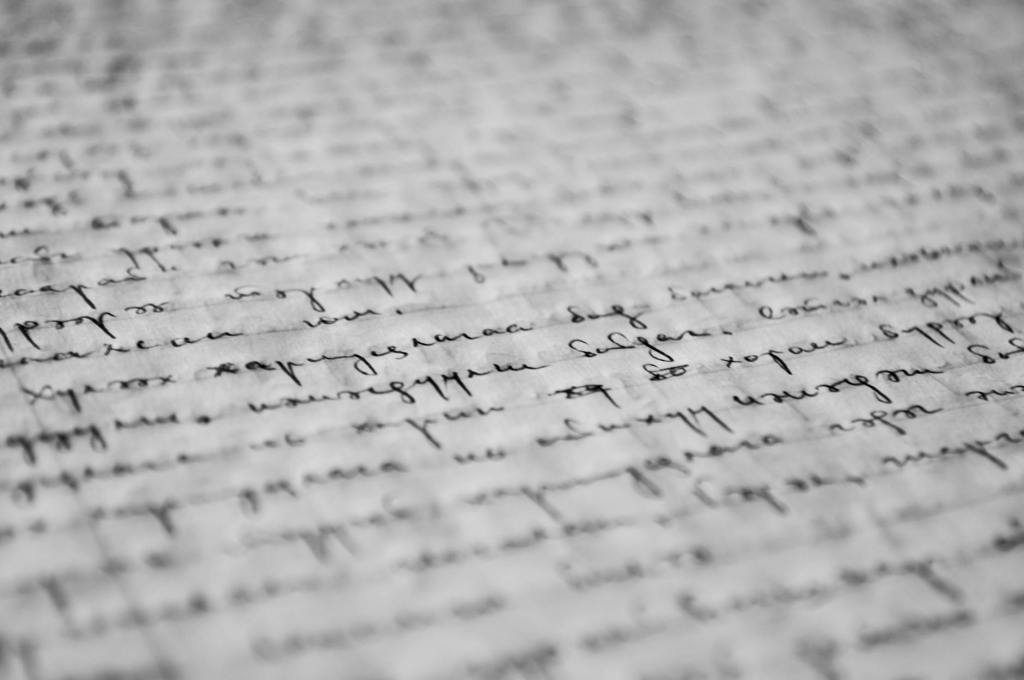 A close-up of a page covered in handwritten text.
