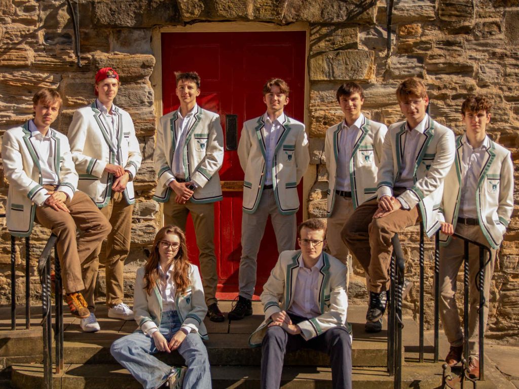 TCBC's First 8's official portrait.