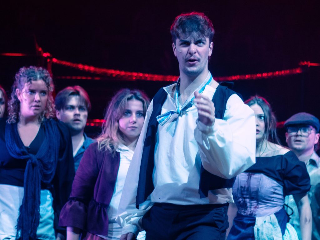 Sweeney and ensemble in DULOG's production of Sweeney Todd