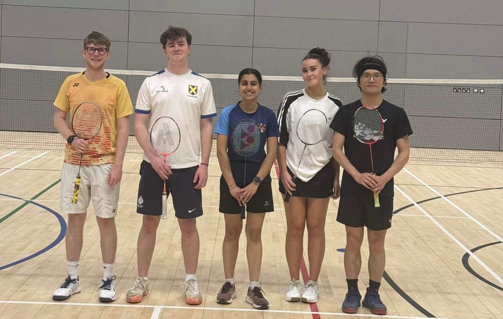 Trevs Mixed A lined up on the court in front of the net after their match victory against Castle Mixed A. From left to right, Luke Taylor, Ben Gardner, Jasmeet Dhillon, Ava Doyle, Liang Wu.
