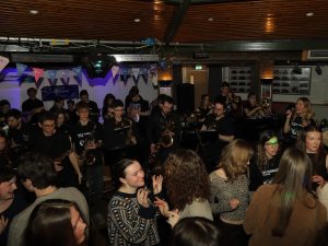 Photo of people dancing in Trevs bar as The Manglers perform